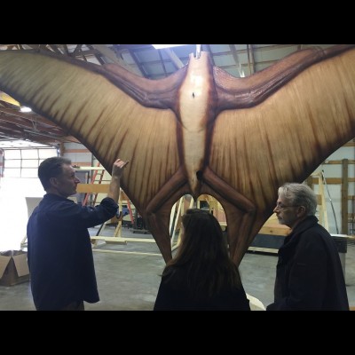 Gary showing a couple of friends the fiber glass Quetzalcoatlus sculpture in progress.