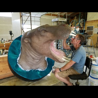 Gary working on a sculpture of the Alaskan Ounalashkastylus, a type of desmostylian for Ray&rsquo;s Cruisin&rsquo; the Fossil Coastline exhibit.