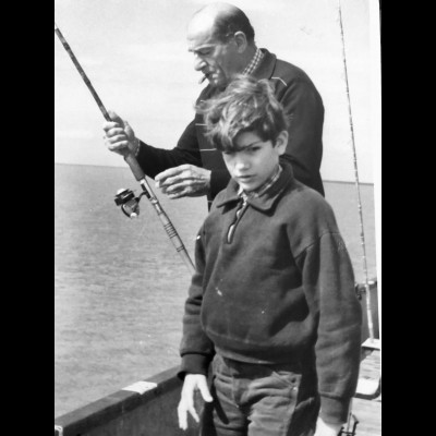 Young Luis fishing with his Grandfather, from whom he inherited his love of nature via their hunting and fishing trips.