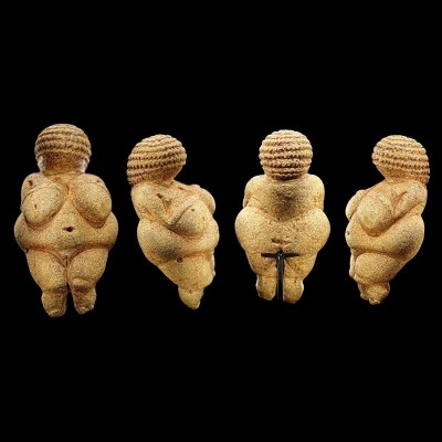 A female figurine also known as the Venus of Willendorf estimated to have been made around 25,000&ndash;30,000 years ago. Dave and Ray discuss this small sculpture with Genevieve.