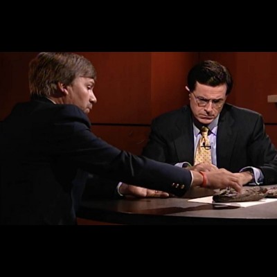 Ted Daeschler on the Colbert Report in 2006, showing Tiktaalik to Stephen.