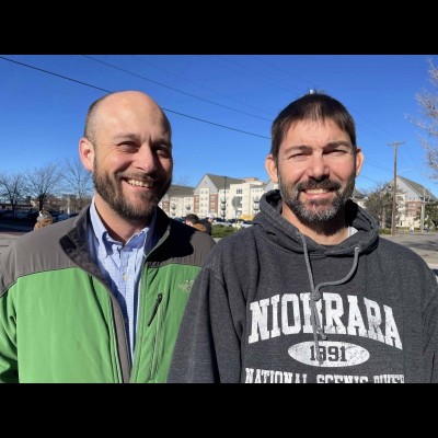 Ash Poust and Shane Tucker standing outside Morril Hall on the University of Nebraska in Lincoln.